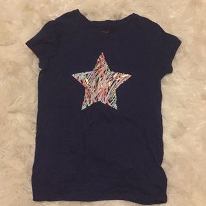 A navy blue cat and jack shirt